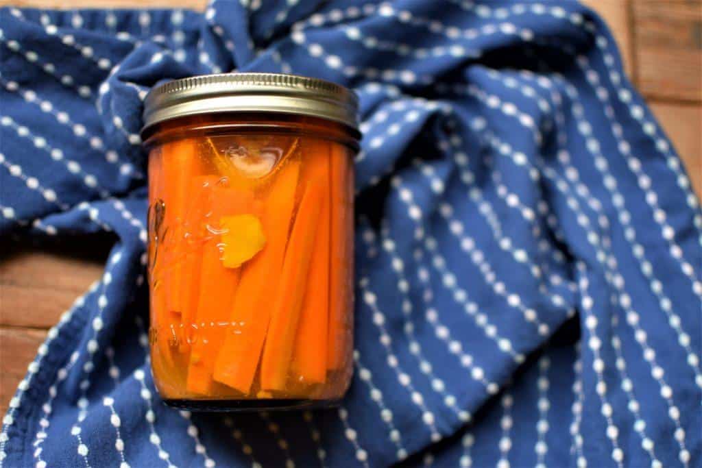 Ginger and turmeric carrot refrigerator pickles in a jar. 