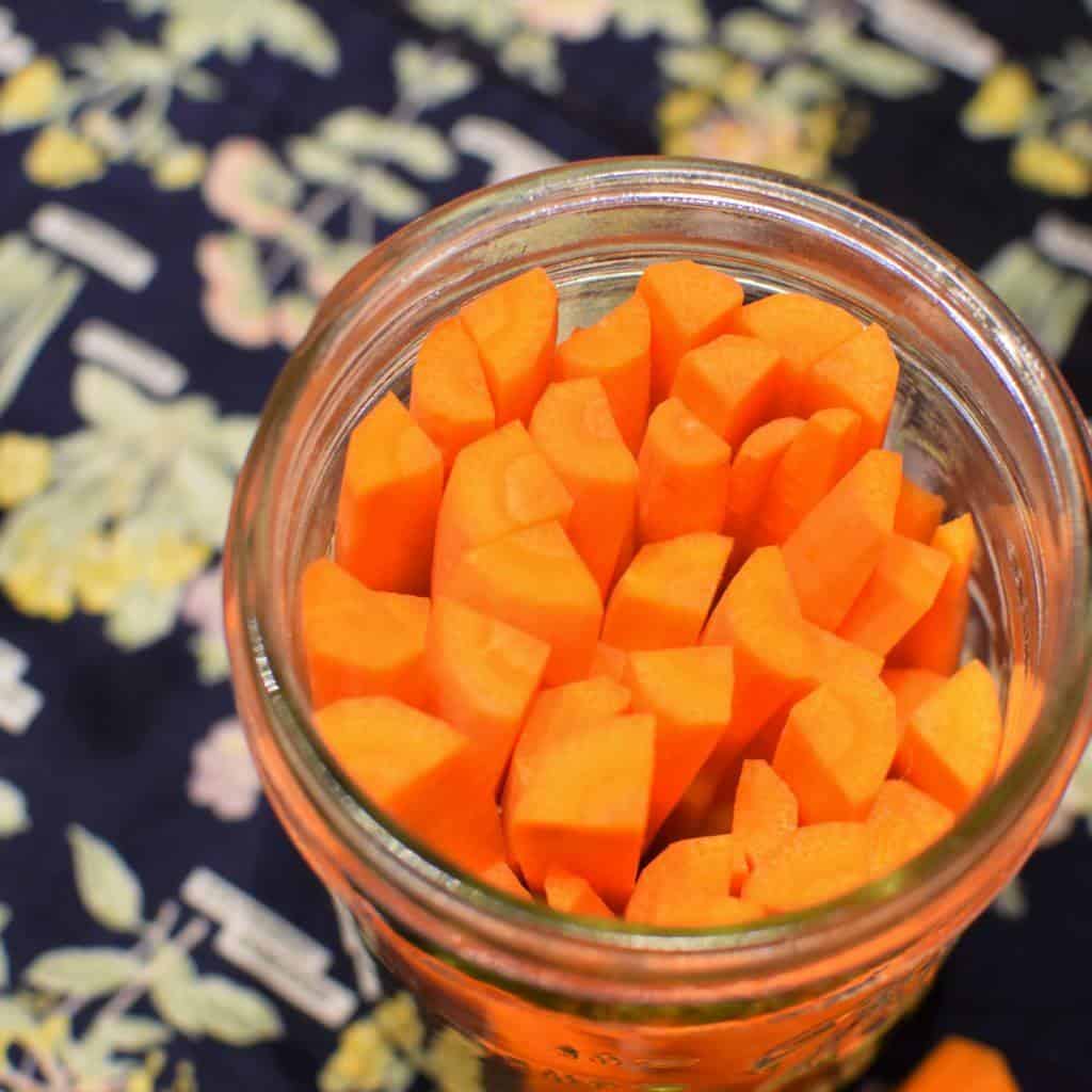 Overhead view of pickled carrots. 