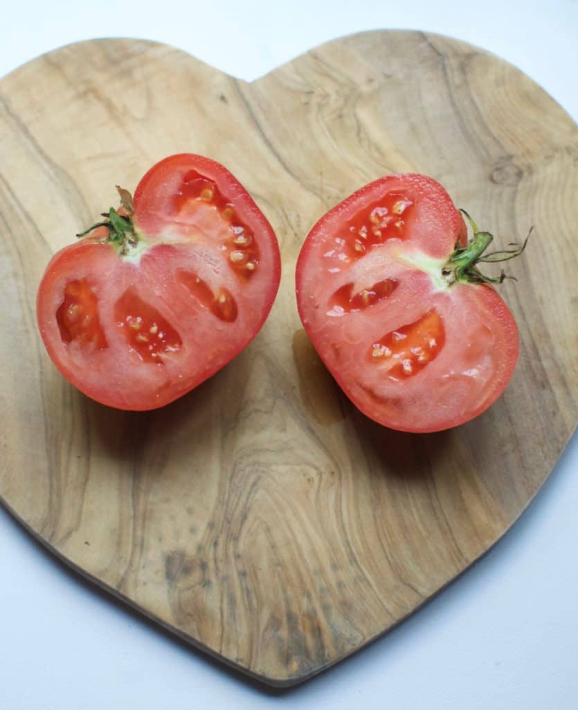 Sliced tomato - seeds exposed. 