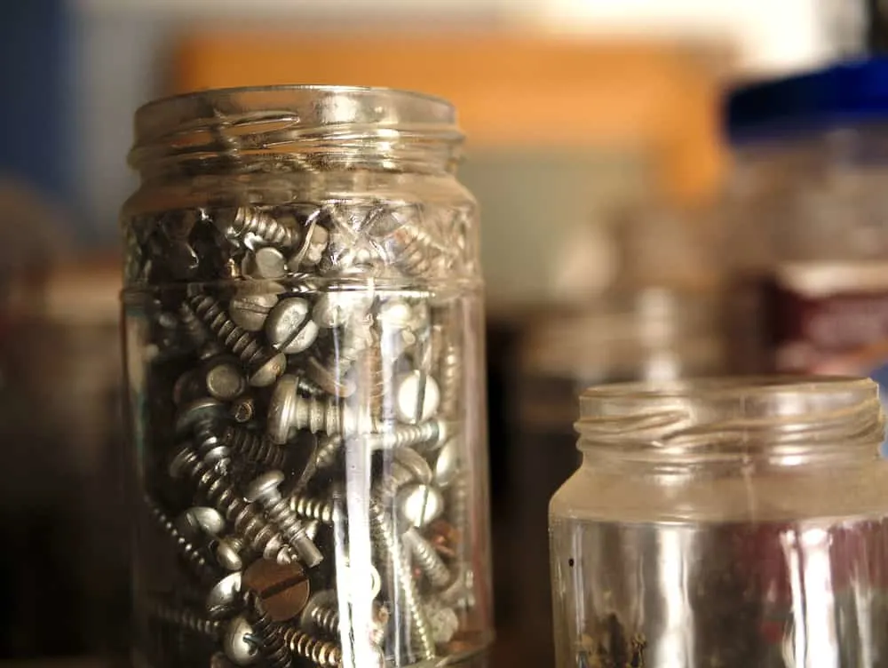 Nuts, bolts and screws in a glass jar