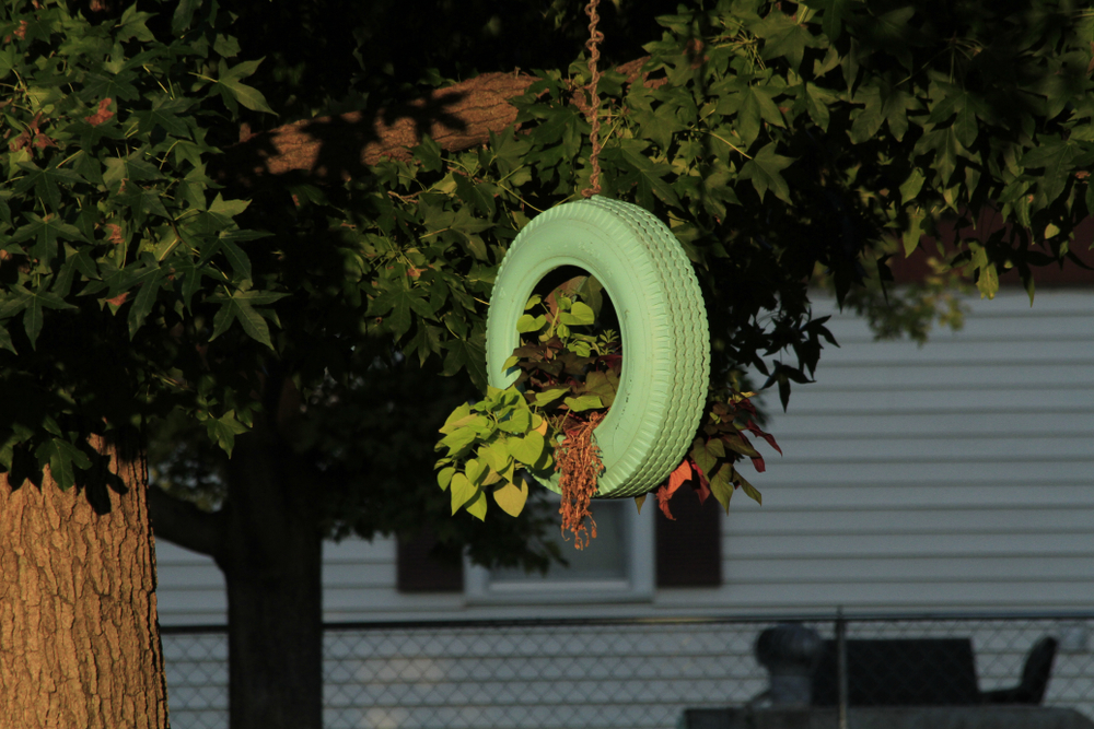 Hanging tire planter