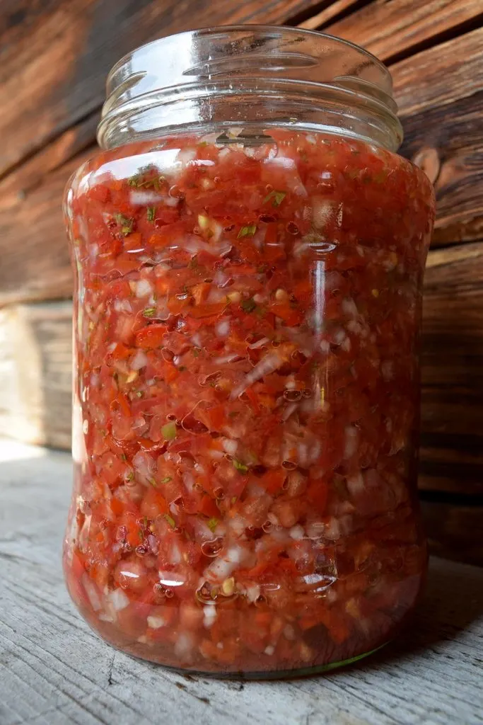 A jar of fermented tomatoes.