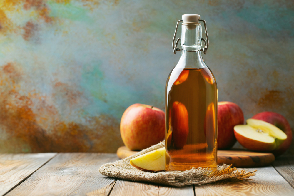 Making a drinking shrub using apples and vinegar is a way of preserving apples.
