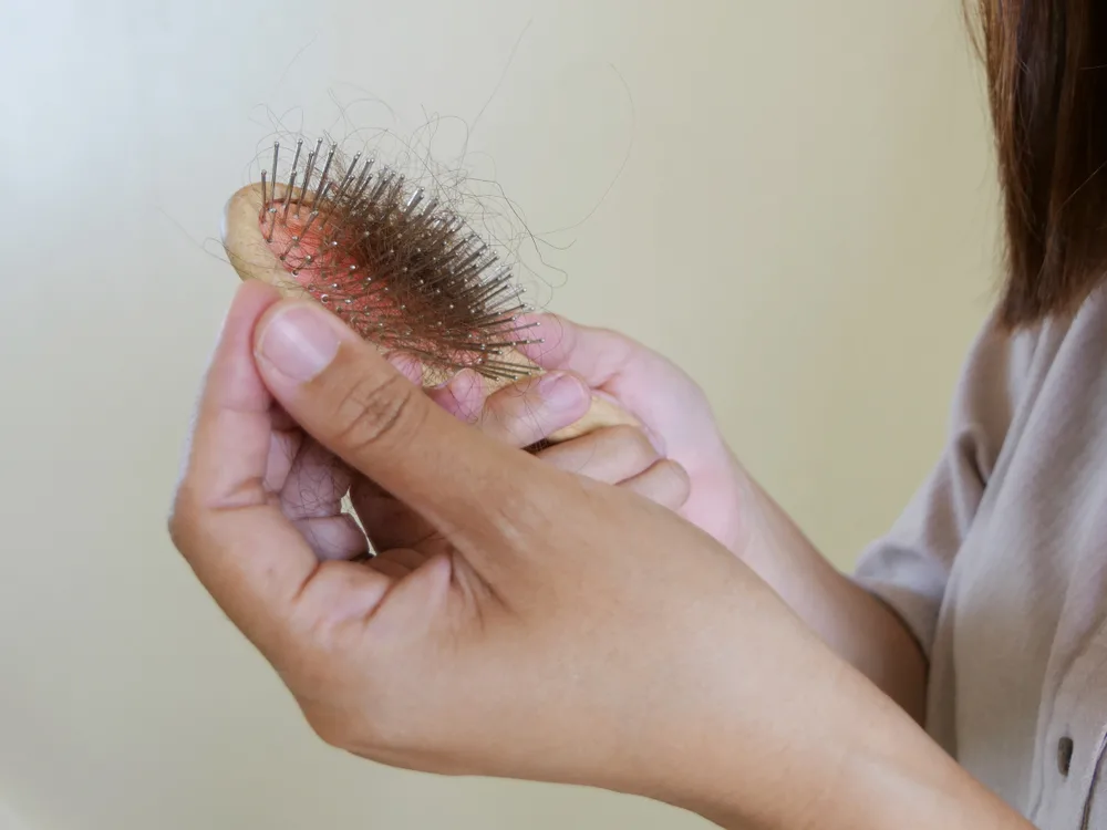 Clearing hair from hair brush
