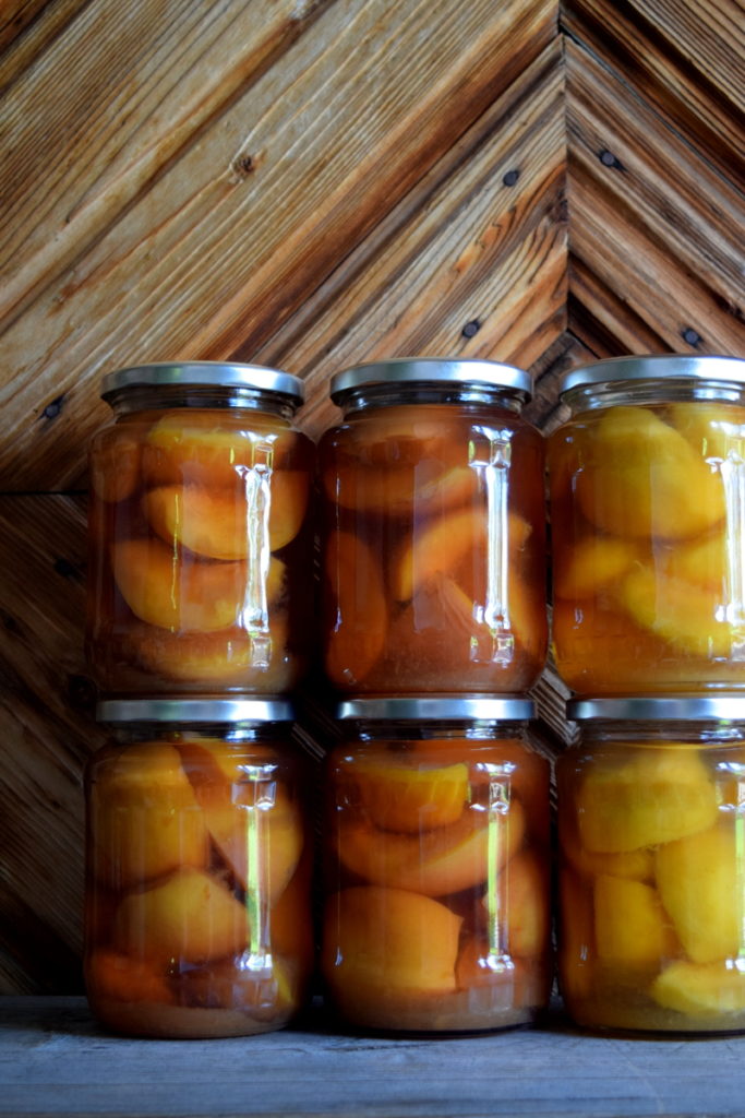 Jars of canned peaches