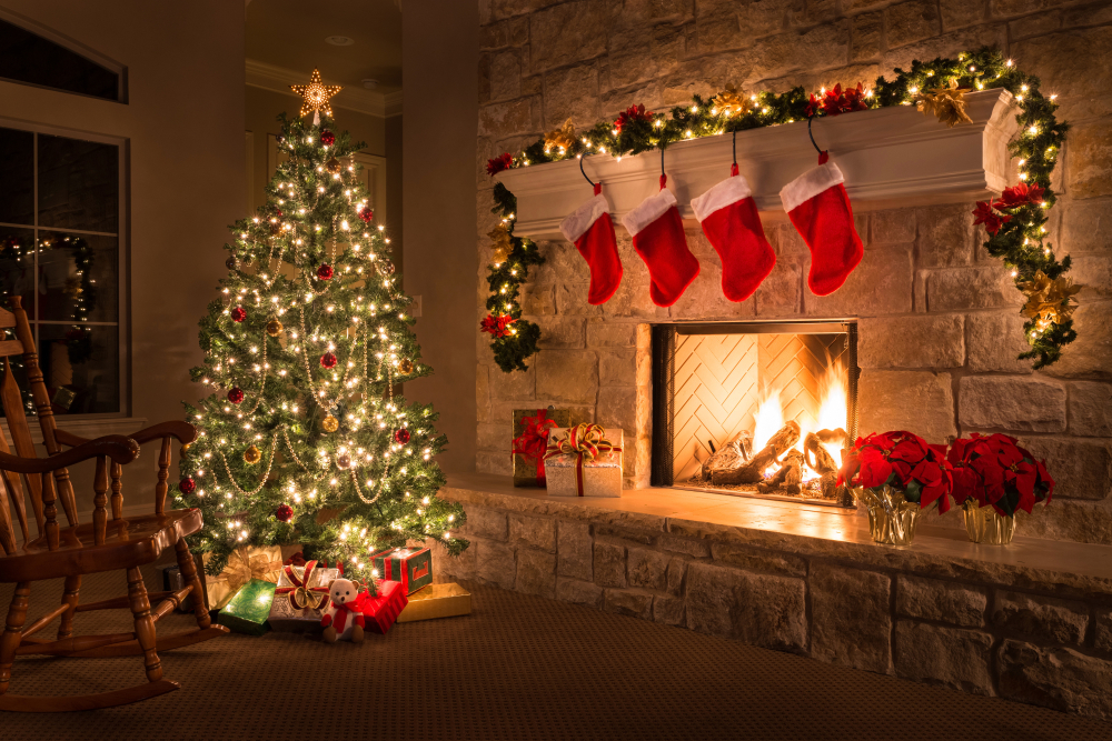 A traditional Christmas scene, a decorated Christmas tree near a fireplace in a cozy, dark decorated living room.