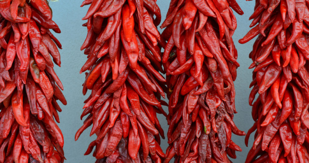 Strings of Anaheim peppers hanging to dry. 