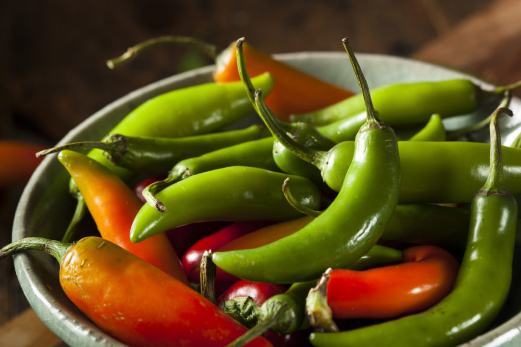 A bowl of serrano peppers.