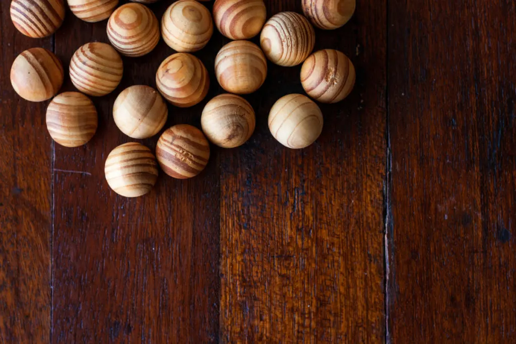 Cedar balls on a wooden floor