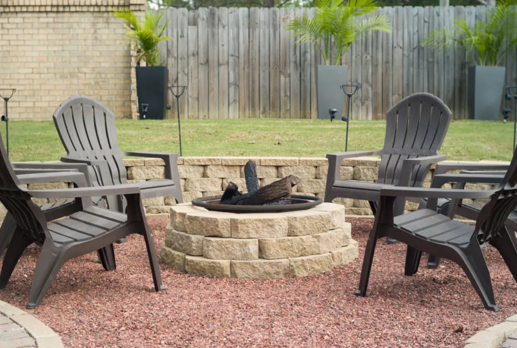 Backyard fire pit with chairs