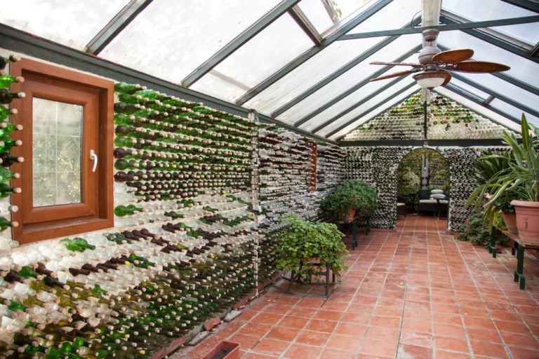 20 Epic Ways To Reuse Glass Bottles in Your Garden