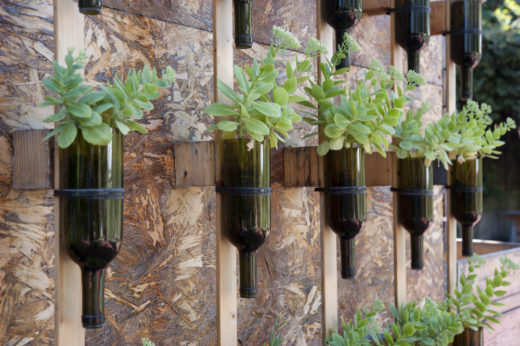 20 Epic Ways To Reuse Glass Bottles in Your Garden