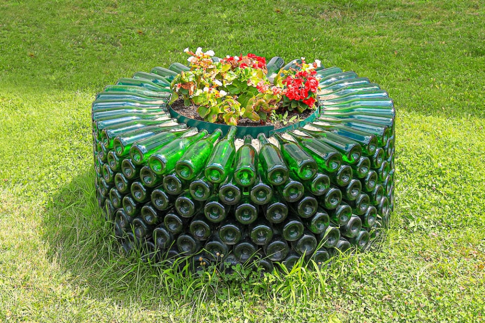 20 Epic Ways To Reuse Glass Bottles in Your Garden