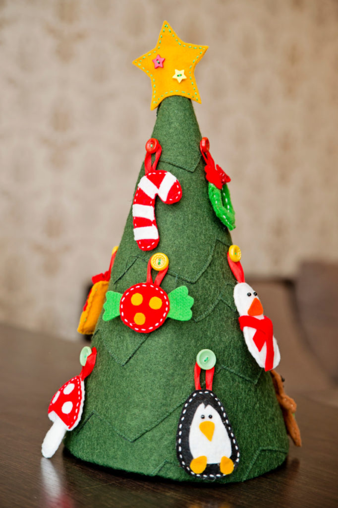 A felt Christmas tree with felt ornaments made for a small child