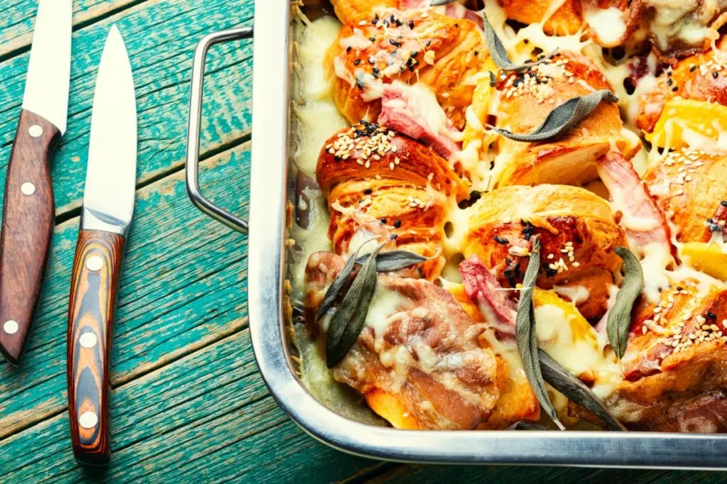 Casserole with sage leaves on top