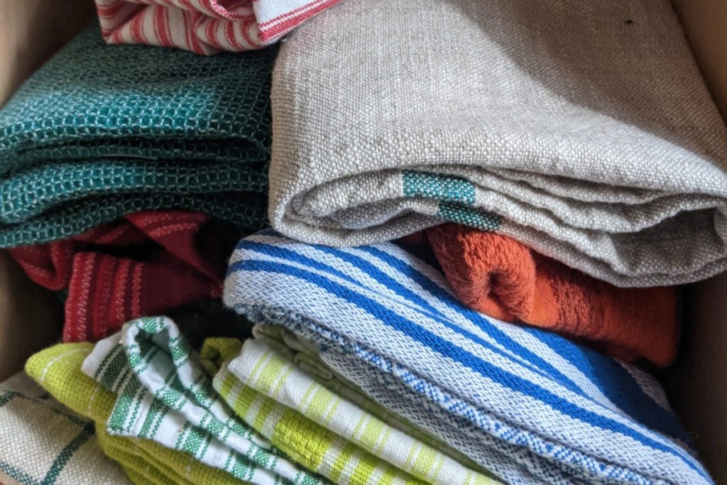 Stack of folded dish towels.
