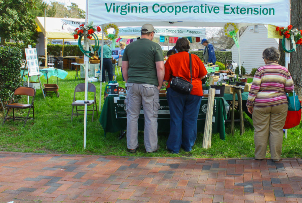 People standing by a Virginia Cooperative Extension booth