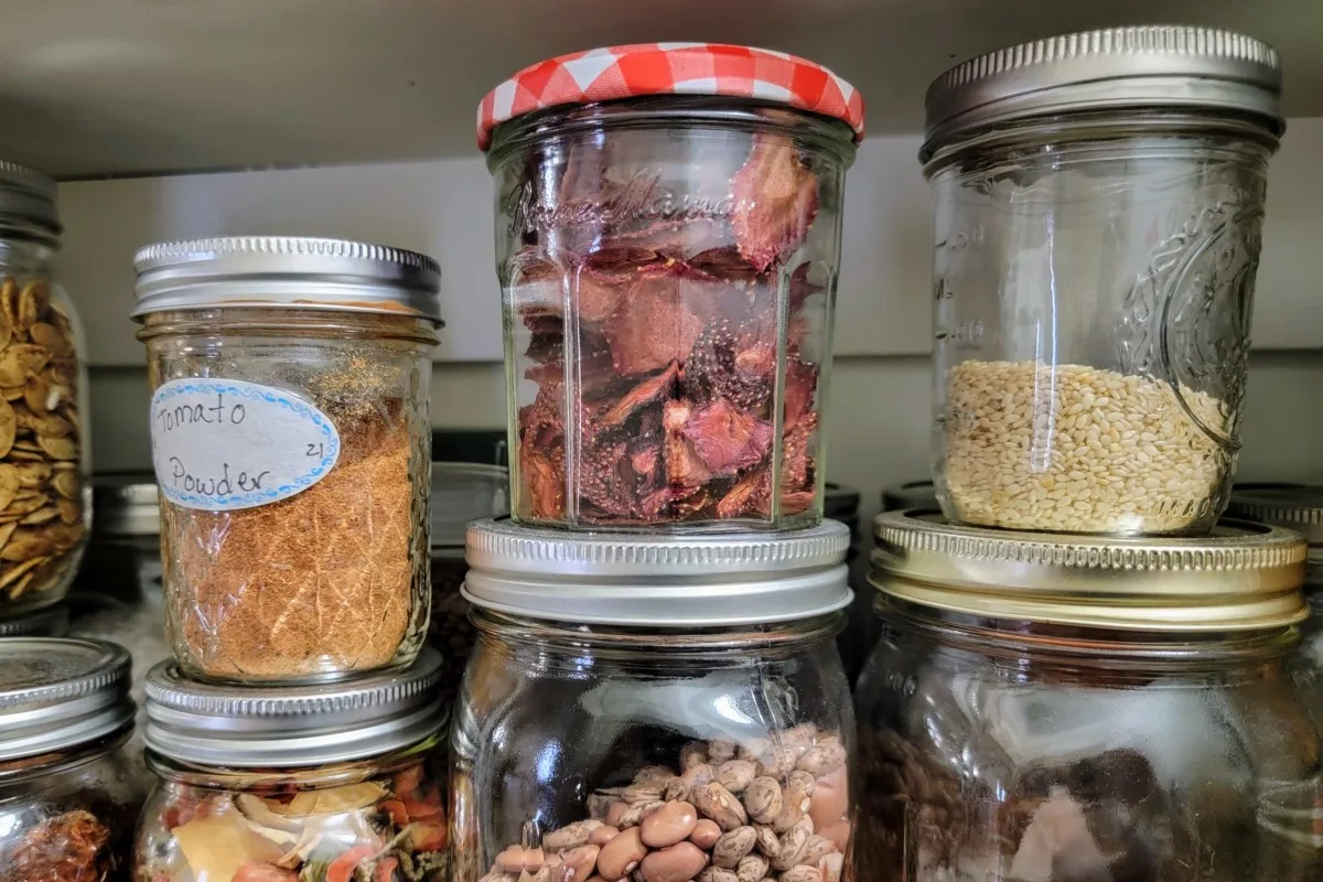 Dehydrated strawberries in a jar in a pantry
