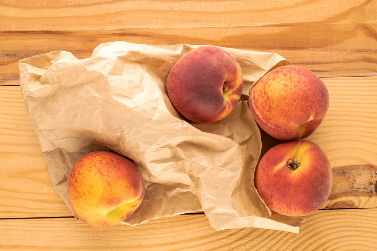 Paper bag with peaches