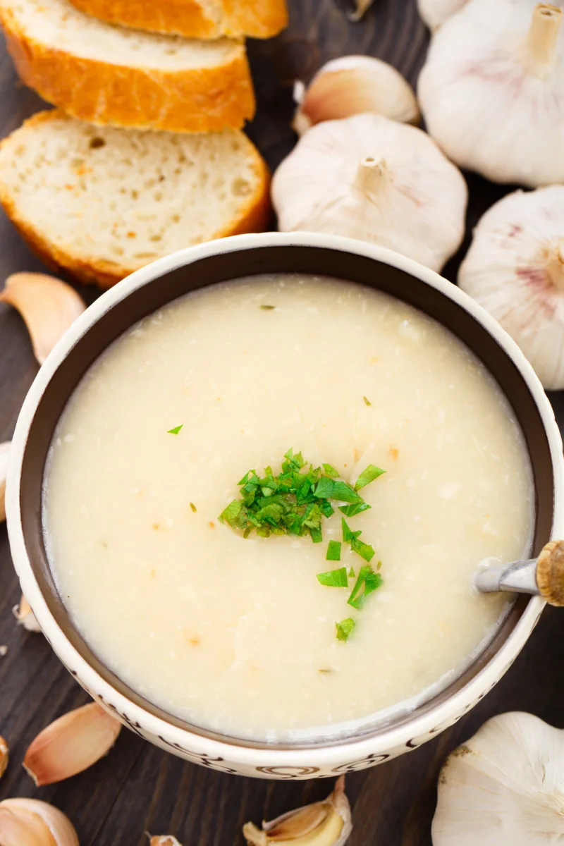 Creamy garlic soup in a bowl 