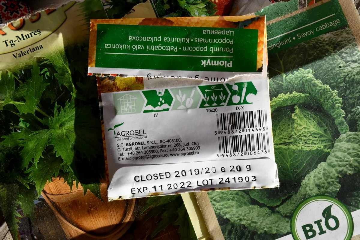 Close up of seed packet showing expiration date. 