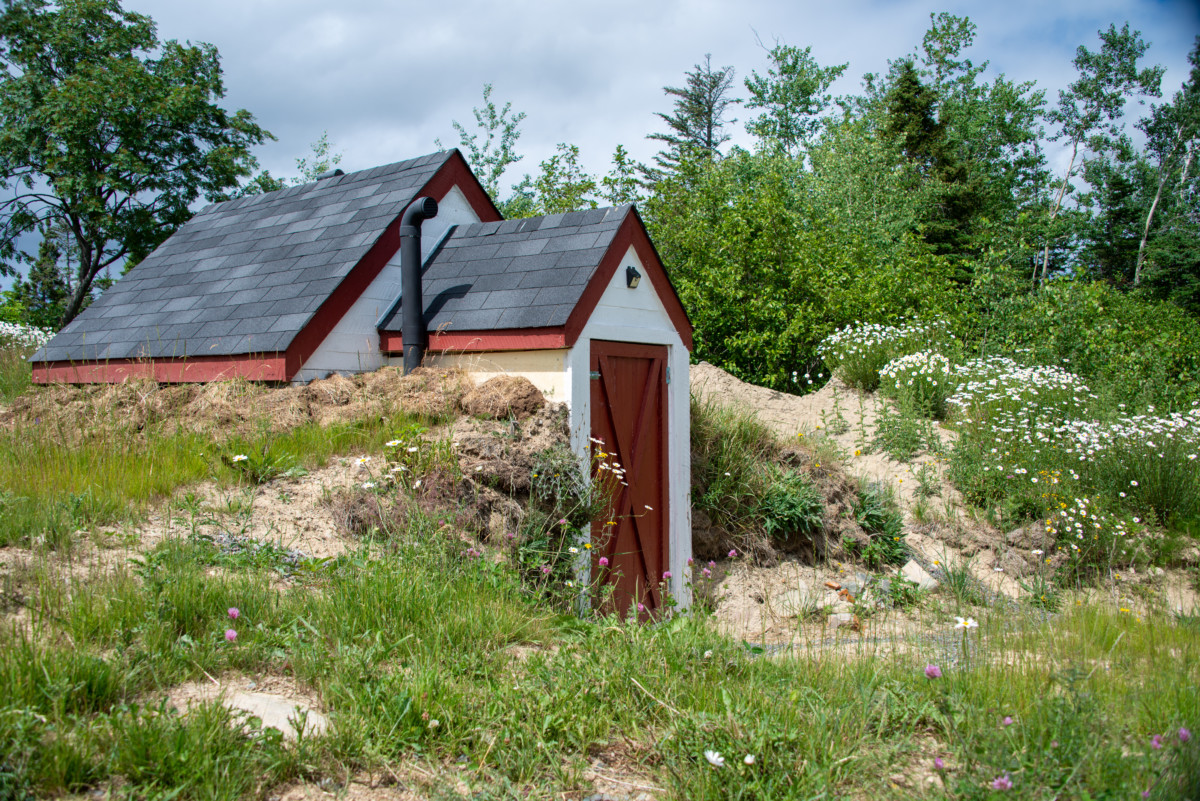 A root cellar built into the side of a hill.