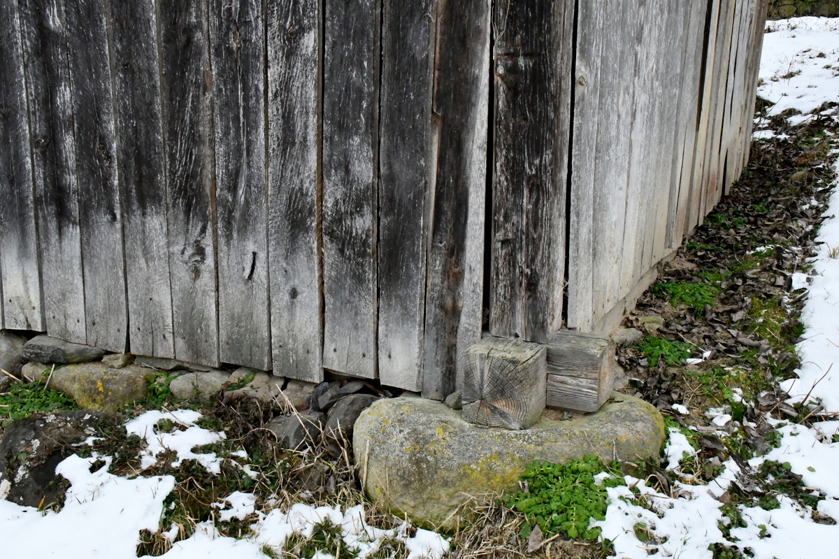Foundation of old wooden garden shed. 