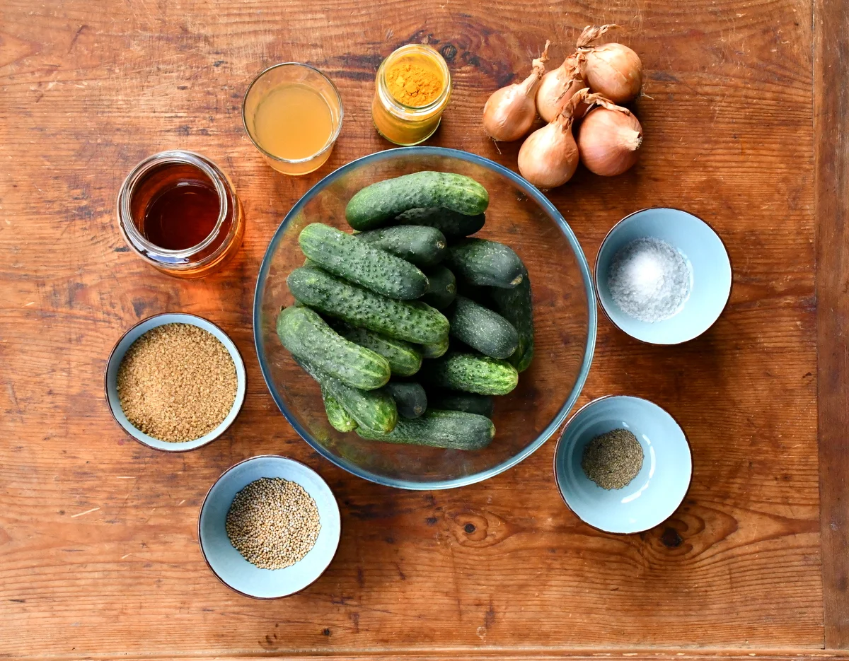 Pickle ingredients laid out on a cutting board.