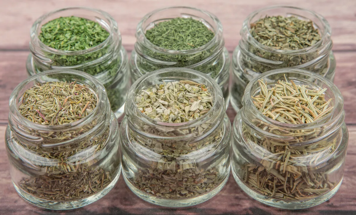 Small jars with dried herbs