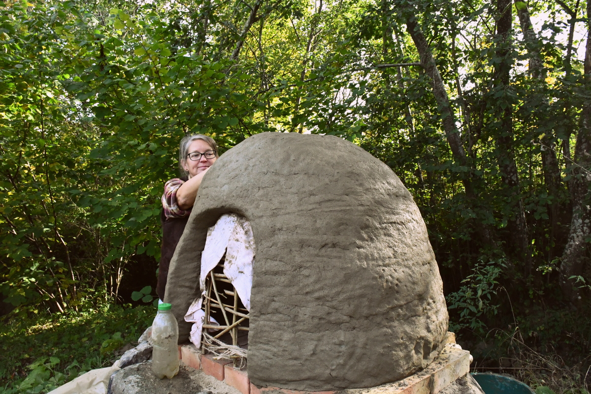 Author working on building a cob oven