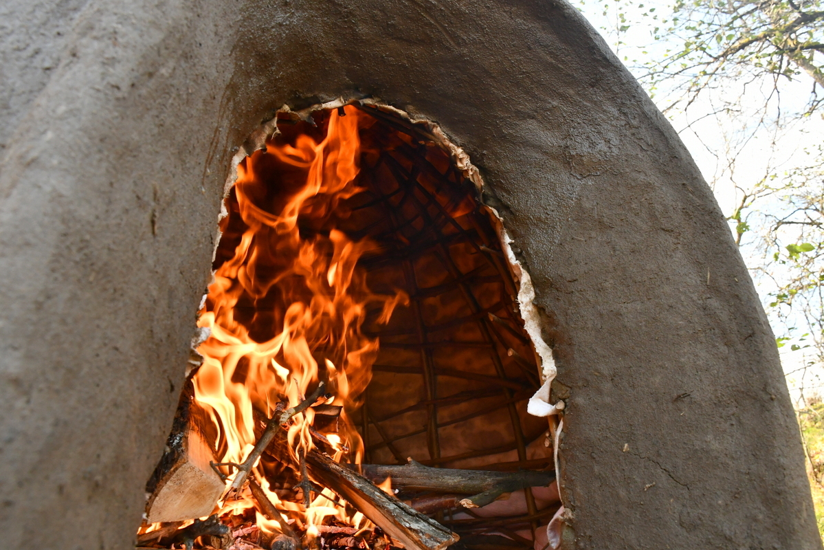 Fire in a cob oven