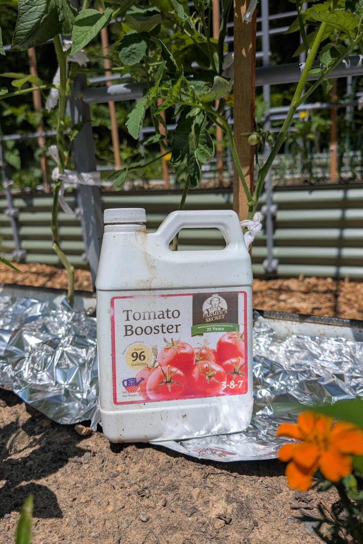 A bottle of Farmer's Secret Tomato Booster