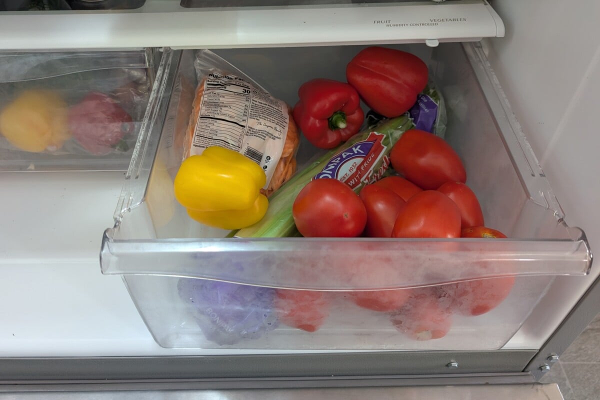  Tomatoes in the crisper drawer of the fridge. 