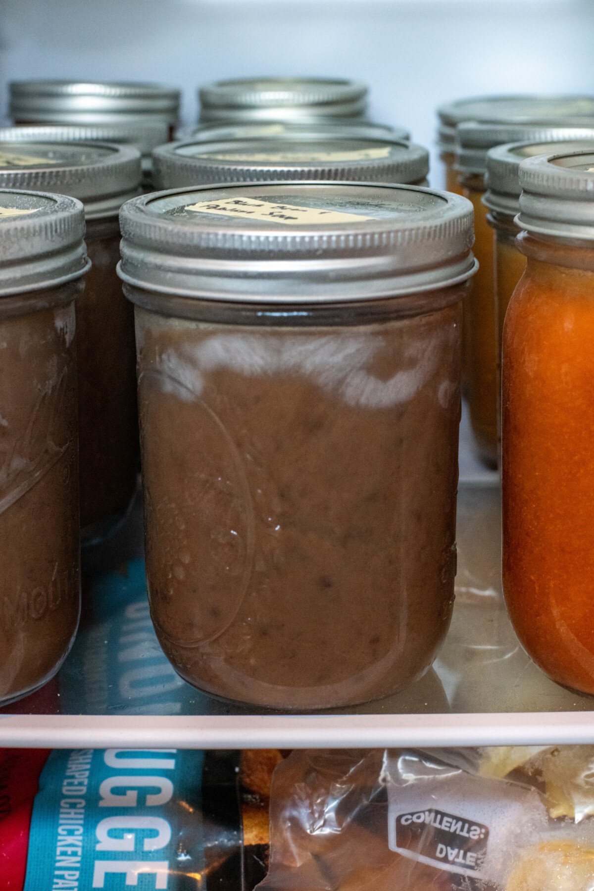 Jar of black bean soup in freezer