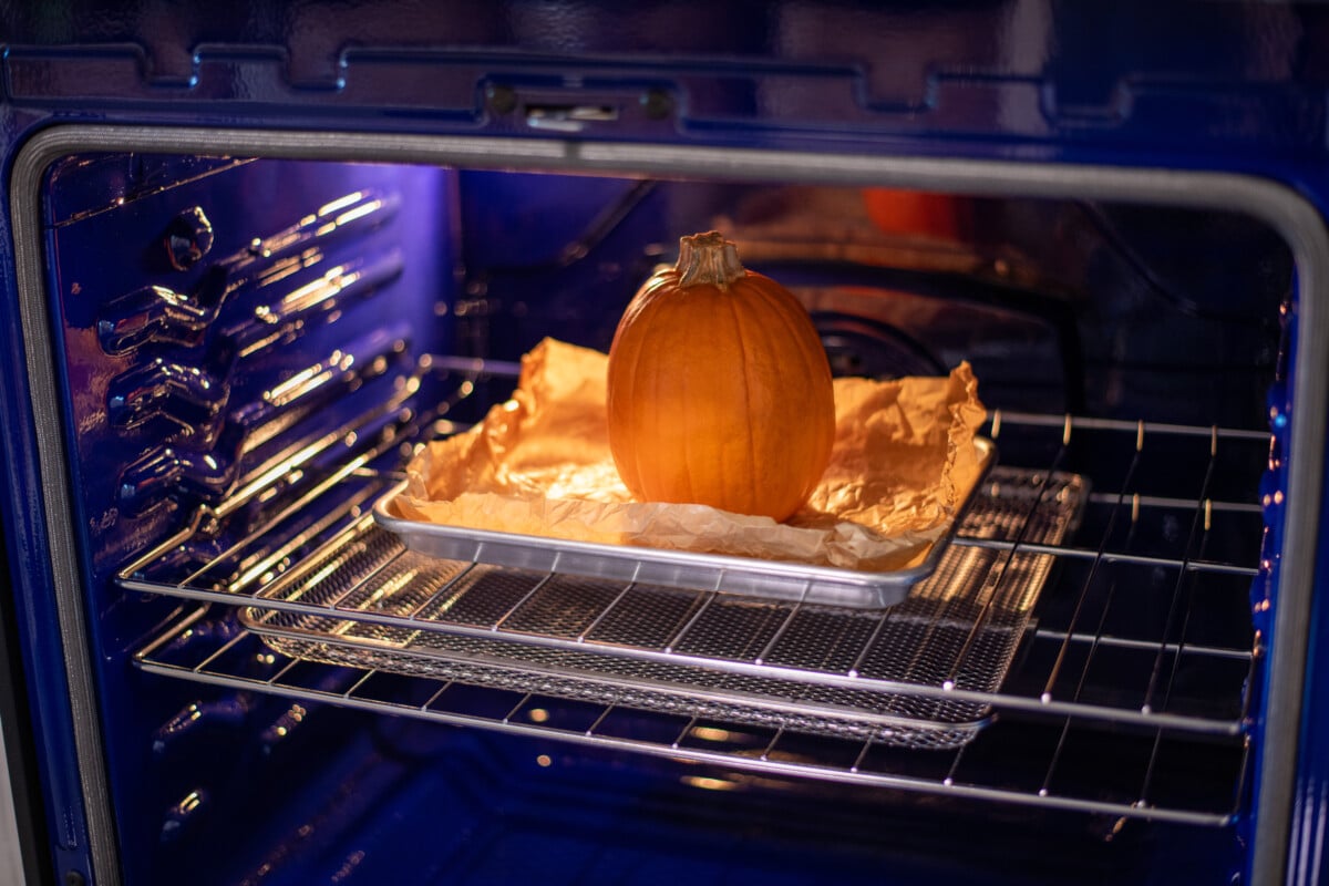 Pumpkin in oven on baking sheet