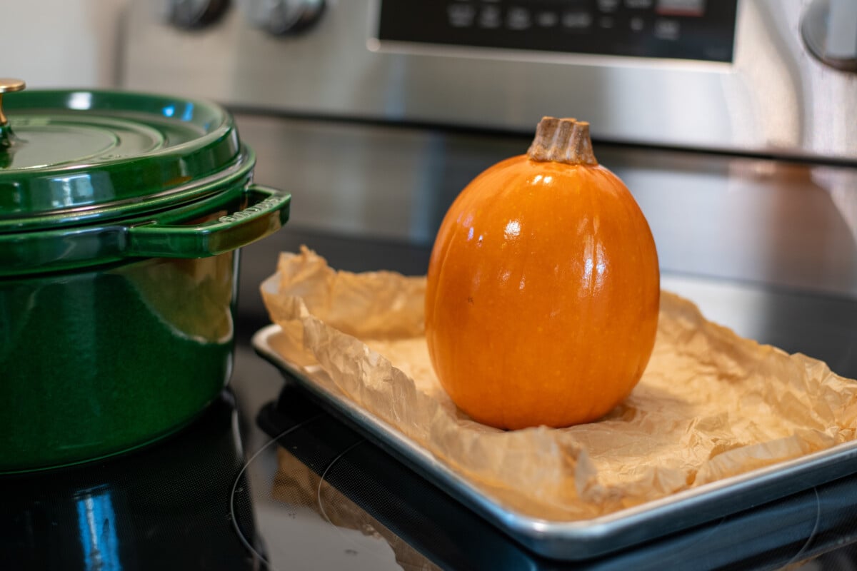 Baked pumpkin cooling on a baking sheet