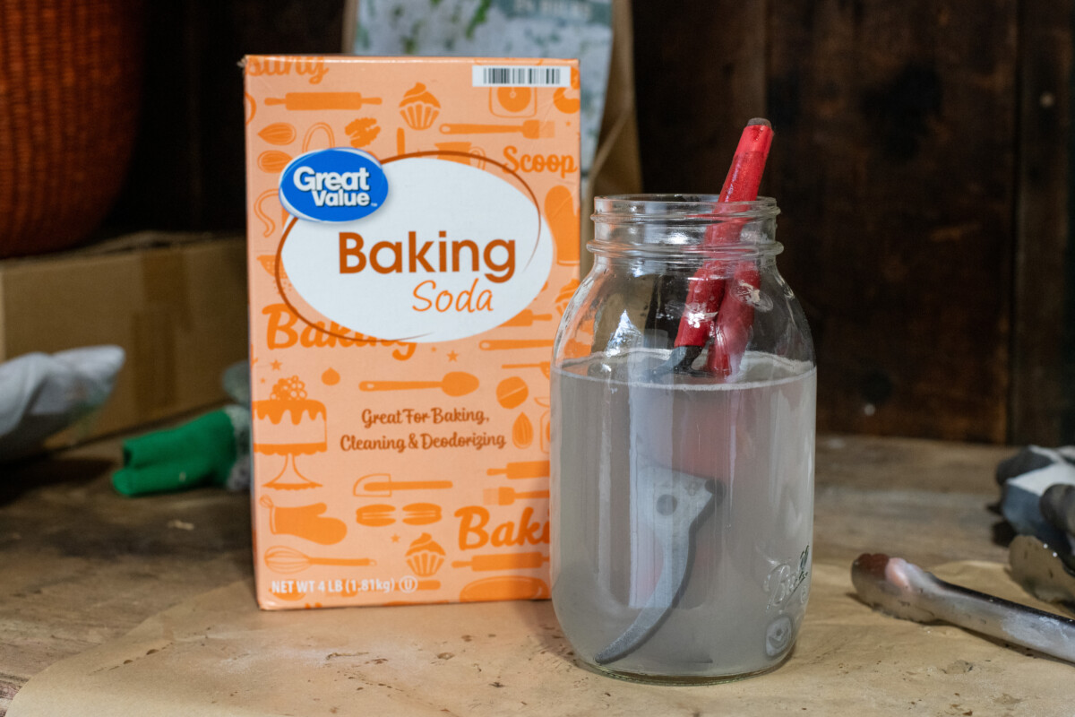 Pruning sheers soaking in solution of baking soda and water.