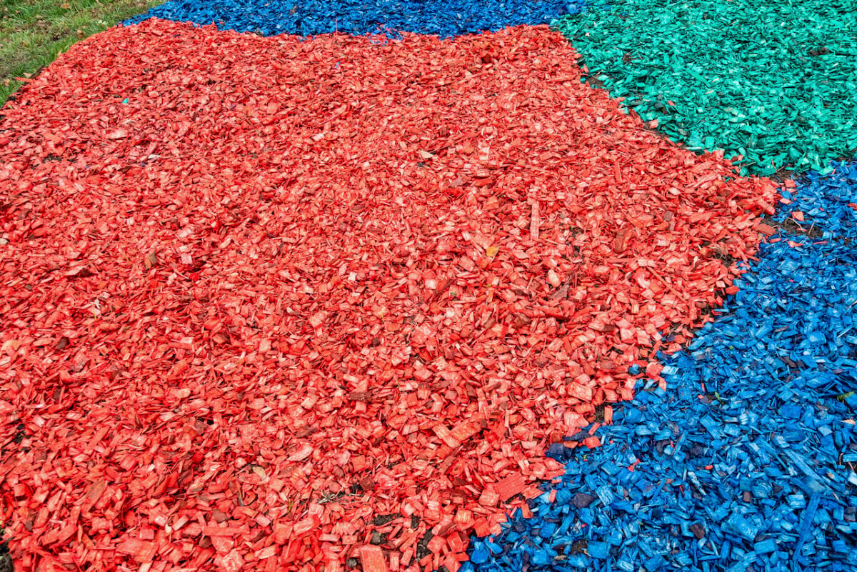 Brightly dyed wood chip mulch
