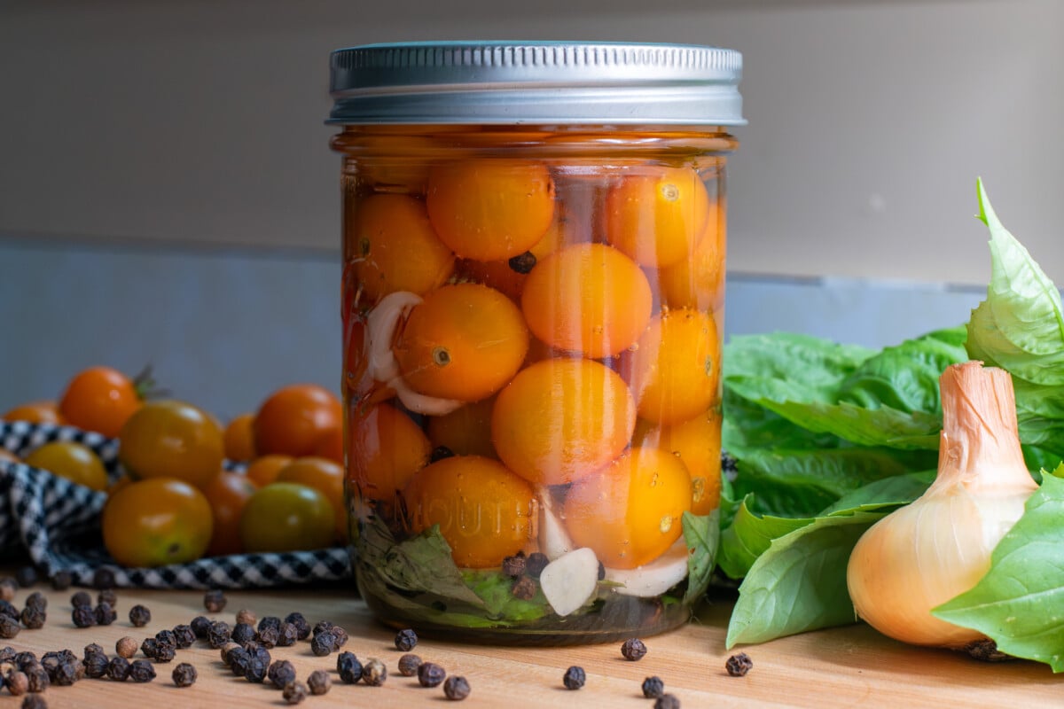 Jar of pickled cherry tomatoes