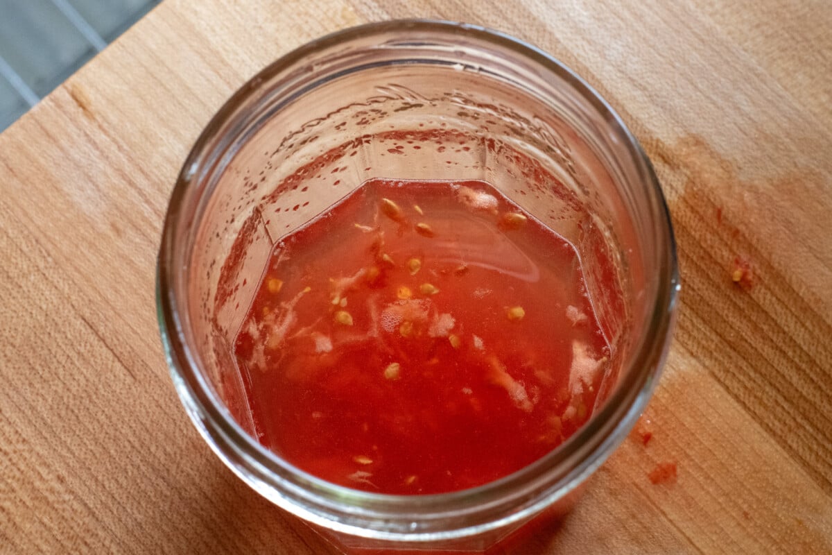 water and tomato seeds and gel in a jar