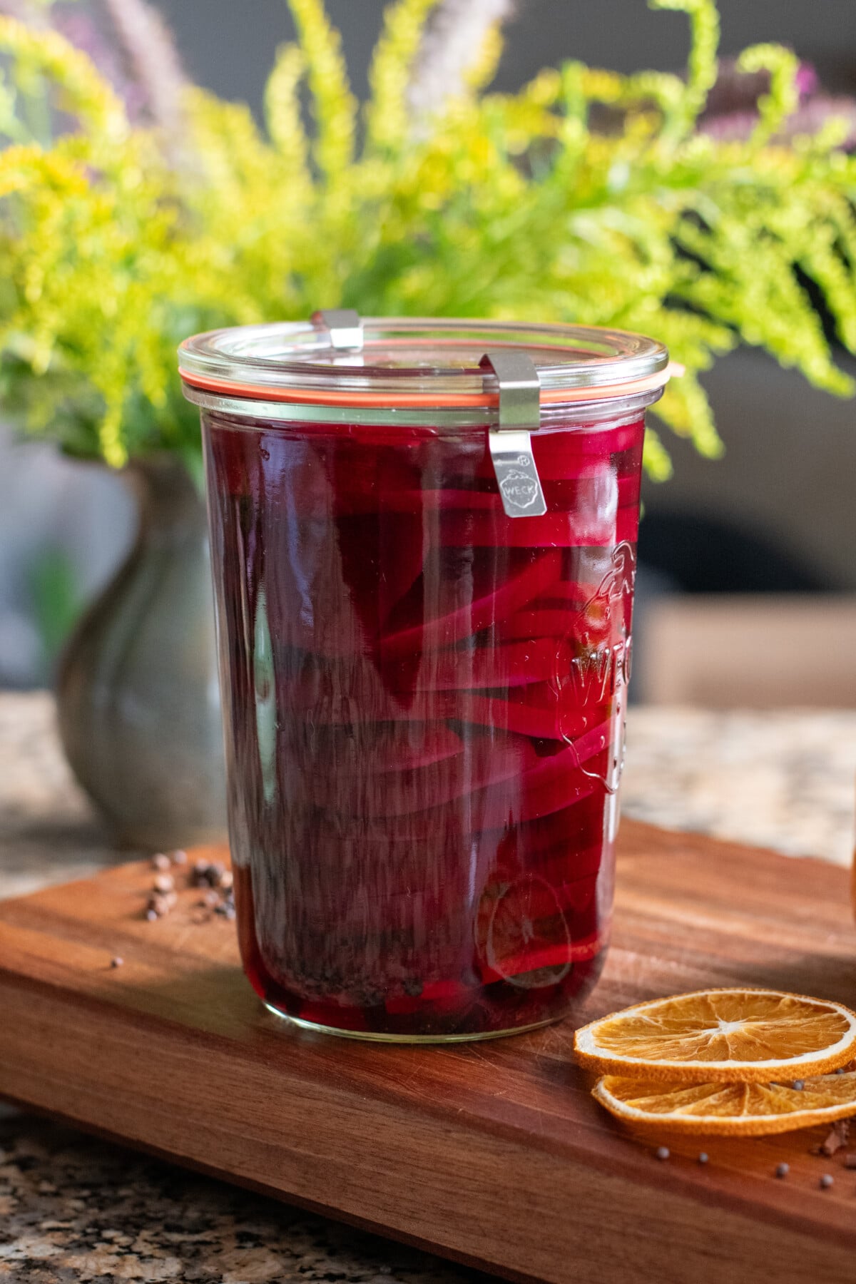 A jar of red pickled beets