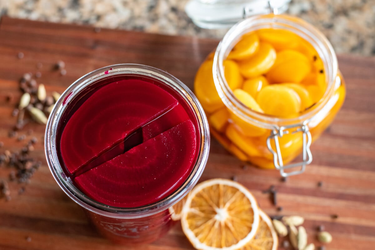 Overhead view of two jars of pickled beets